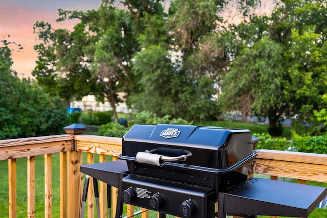 deck featuring a grill