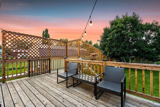 deck featuring a lawn