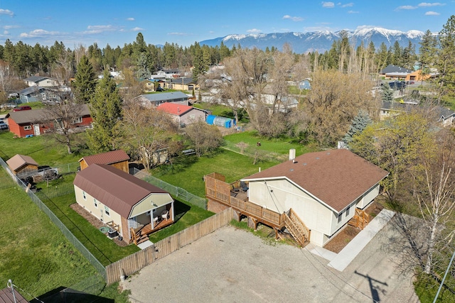 birds eye view of property featuring a mountain view and a residential view