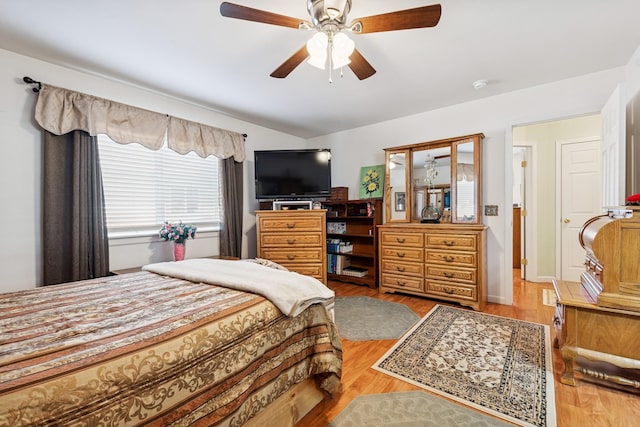 bedroom featuring a ceiling fan and wood finished floors