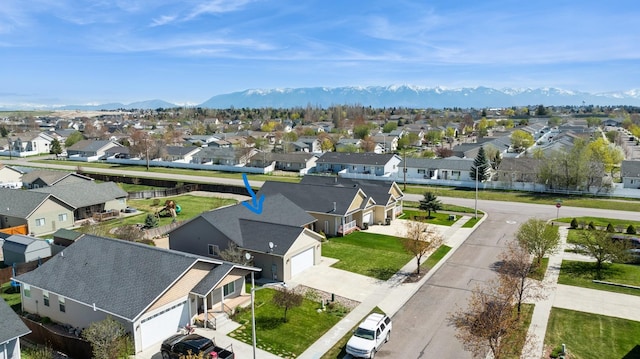 bird's eye view featuring a mountain view and a residential view
