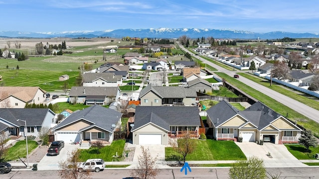 birds eye view of property featuring a residential view and a mountain view