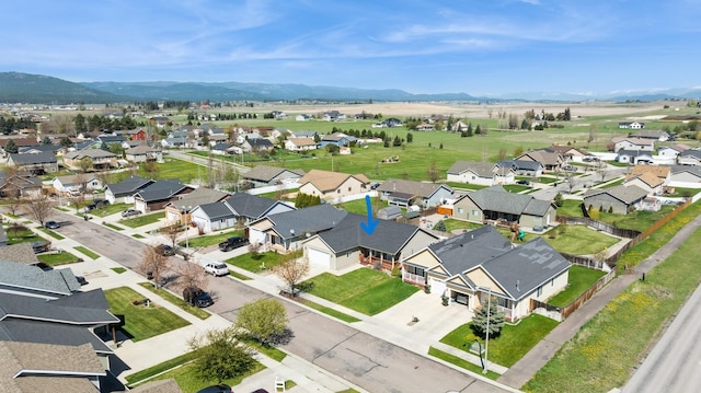 aerial view with a mountain view and a residential view