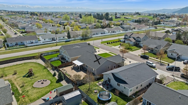 drone / aerial view with a mountain view and a residential view