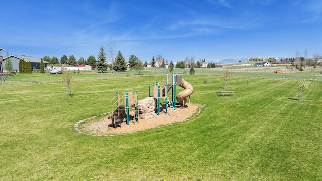 view of yard featuring playground community