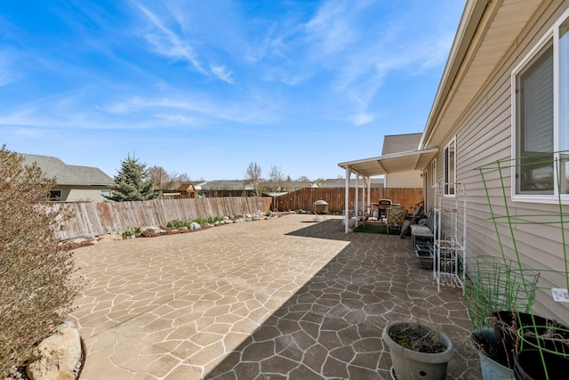 107 Cally Ln, Kalispell, MT 59901 - fenced backyard with a patio