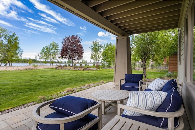 view of patio featuring a water view