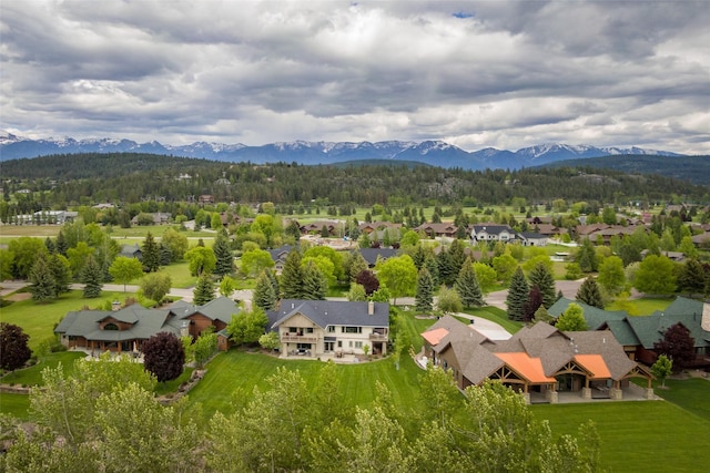 drone / aerial view featuring a mountain view and a residential view