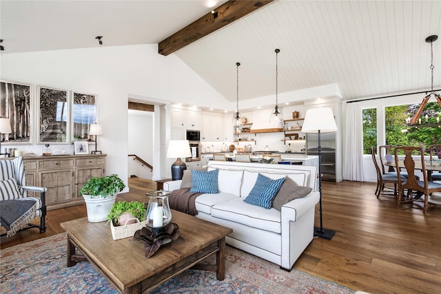 living room featuring beamed ceiling, high vaulted ceiling, and dark wood-type flooring