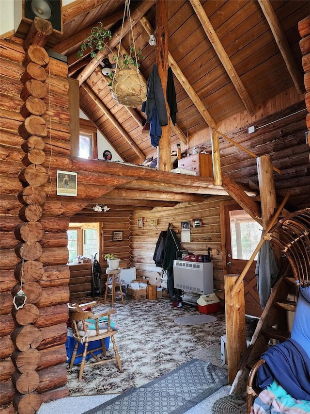interior space featuring a wealth of natural light and heating unit