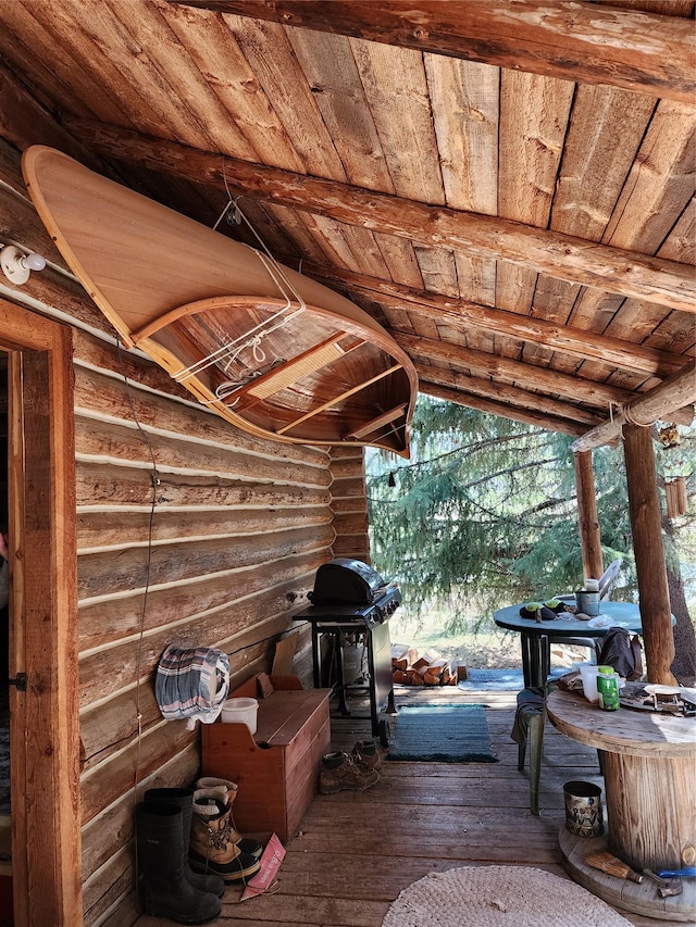 wooden terrace featuring area for grilling