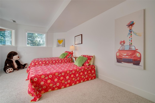 carpeted bedroom with baseboards and visible vents