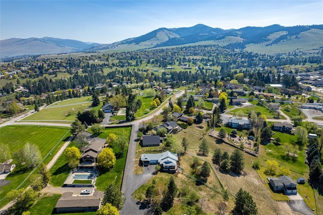drone / aerial view featuring a mountain view and a residential view