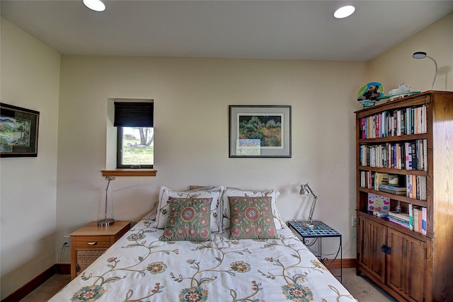 bedroom with baseboards, recessed lighting, and carpet floors