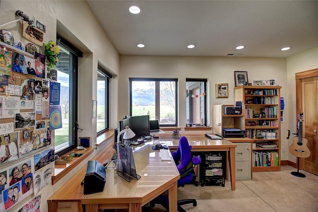office space with visible vents and recessed lighting