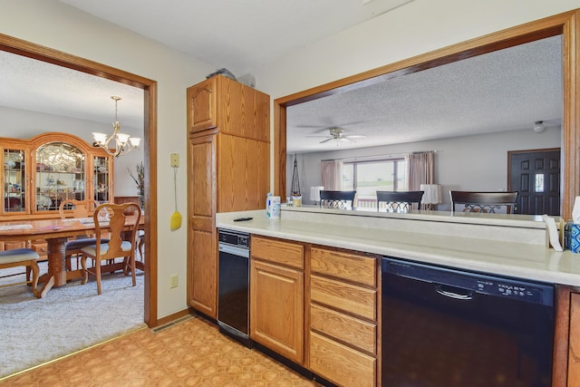 kitchen featuring ceiling fan with notable chandelier, black dishwasher, brown cabinetry, light colored carpet, and light countertops
