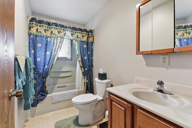 bathroom with toilet, vanity, and shower / tub combo