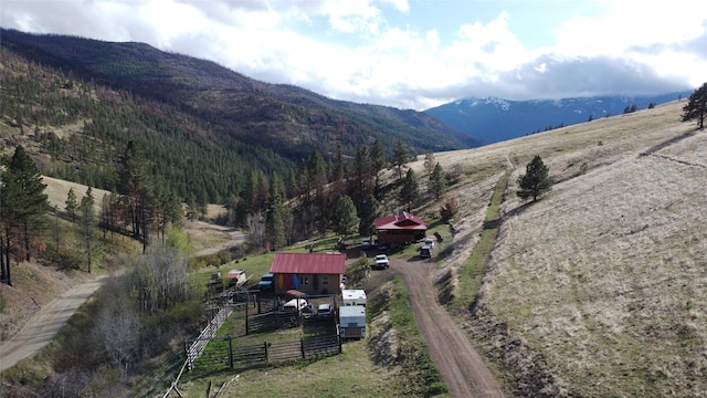 bird's eye view featuring a rural view and a mountain view