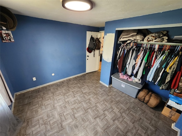 708 35th Ave NE, Great Falls, MT 59404 - unfurnished bedroom featuring a closet and baseboards