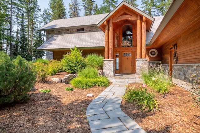 144 S Shore Pl, Seeley Lake, MT 59868 - property entrance featuring stone siding