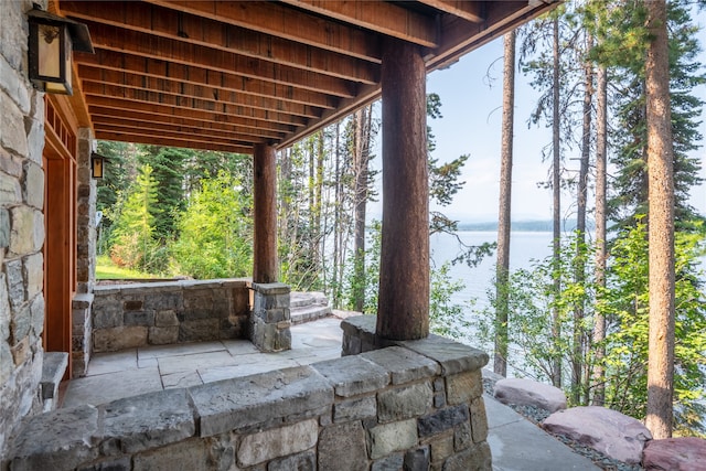 144 S Shore Pl, Seeley Lake, MT 59868 - view of patio / terrace featuring a water view