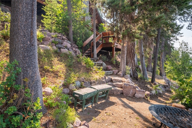 144 S Shore Pl, Seeley Lake, MT 59868 - view of yard featuring stairs and a deck
