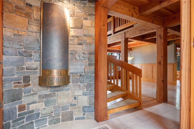 144 S Shore Pl, Seeley Lake, MT 59868 - staircase featuring tile patterned flooring and a wainscoted wall