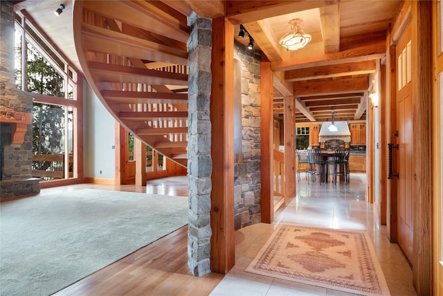 144 S Shore Pl, Seeley Lake, MT 59868 - hall featuring a wooden ceiling with exposed beams and stairway