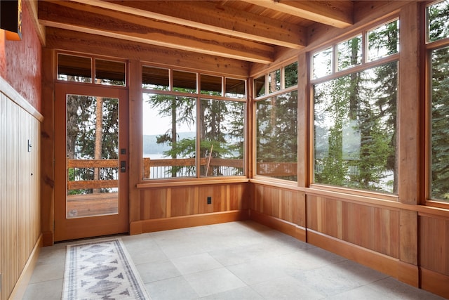 144 S Shore Pl, Seeley Lake, MT 59868 - unfurnished sunroom featuring tile patterned floors and wooden walls
