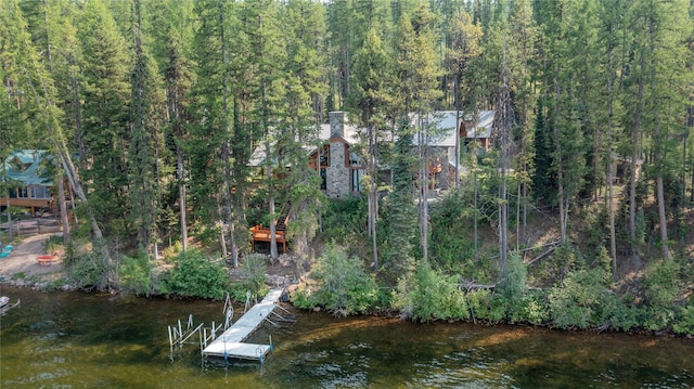 144 S Shore Pl, Seeley Lake, MT 59868 - dock featuring a wooded view