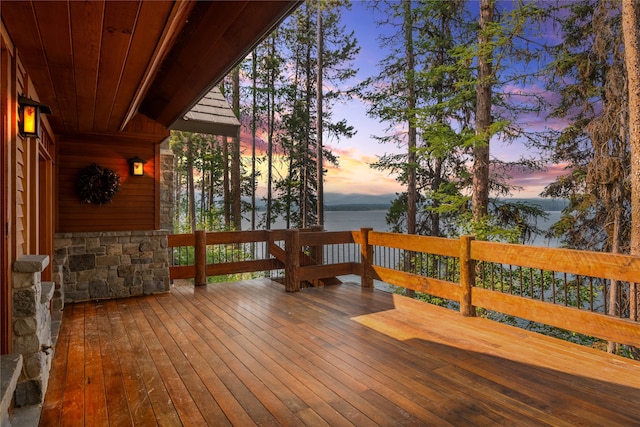 144 S Shore Pl, Seeley Lake, MT 59868 - wooden deck with a water view