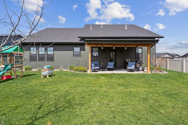 128 Owl Loop, Kalispell, MT 59901 - back of house featuring a patio area and a shingled roof