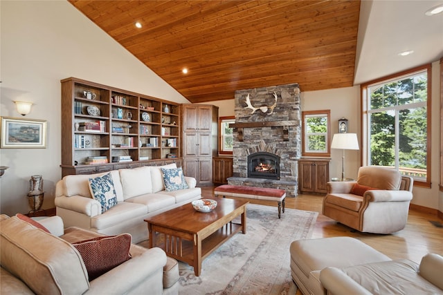 42746 Knuppel Ln, Big Arm, MT 59910 - living area featuring wood ceiling, a fireplace, light wood-type flooring, recessed lighting, and high vaulted ceiling