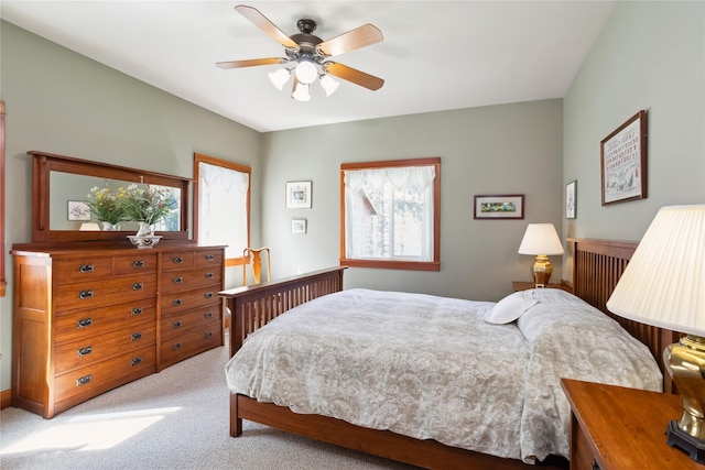42746 Knuppel Ln, Big Arm, MT 59910 - bedroom featuring light colored carpet and a ceiling fan