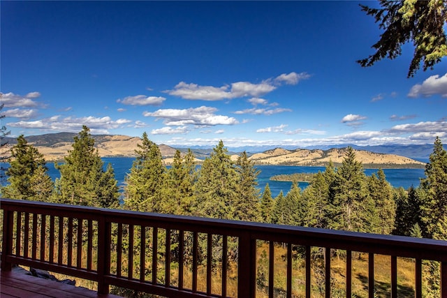 42746 Knuppel Ln, Big Arm, MT 59910 - deck featuring a water and mountain view