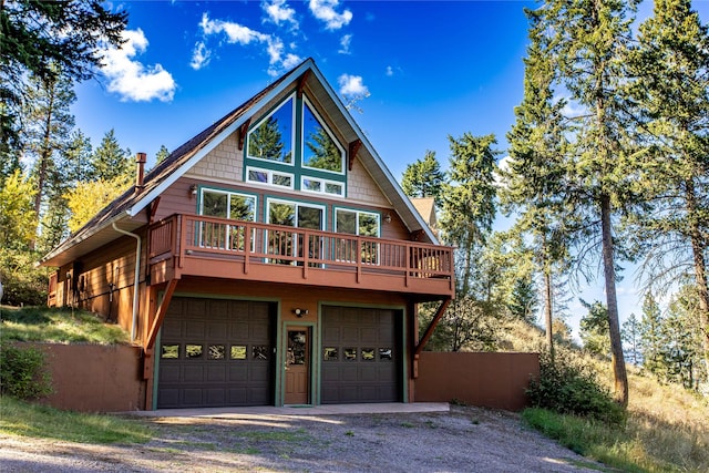 42746 Knuppel Ln, Big Arm, MT 59910 - view of front facade with driveway and an attached garage