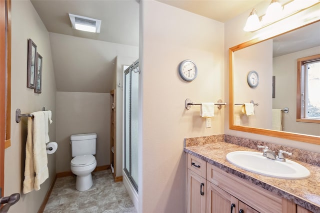 42746 Knuppel Ln, Big Arm, MT 59910 - full bath with a stall shower, toilet, vanity, and baseboards