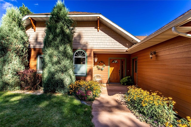 42746 Knuppel Ln, Big Arm, MT 59910 - doorway to property with a lawn