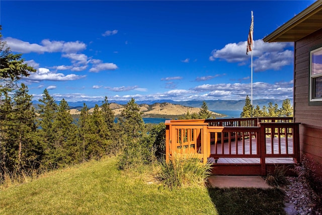 42746 Knuppel Ln, Big Arm, MT 59910 - view of yard featuring a deck with water view