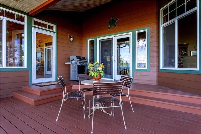 42746 Knuppel Ln, Big Arm, MT 59910 - wooden terrace with grilling area