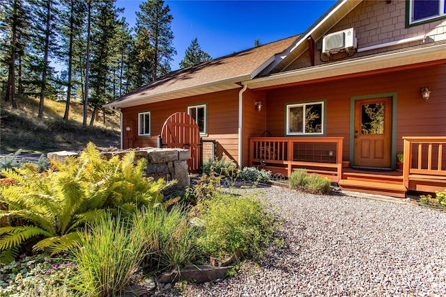42746 Knuppel Ln, Big Arm, MT 59910 - entrance to property with roof with shingles