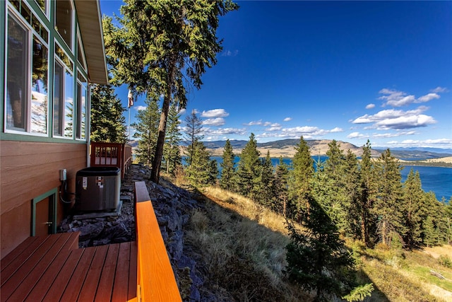 42746 Knuppel Ln, Big Arm, MT 59910 - deck featuring central air condition unit and a water and mountain view