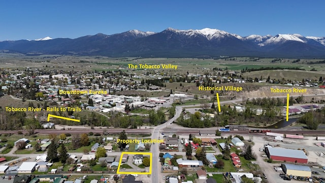 aerial view with a residential view and a mountain view