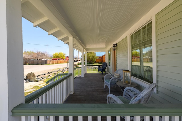 wooden terrace with covered porch
