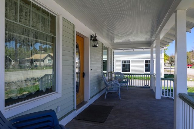 deck featuring covered porch