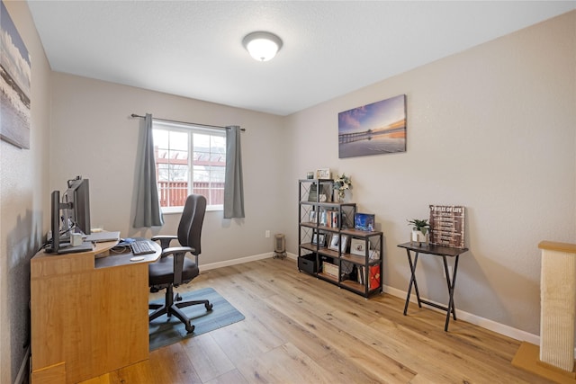 3817 Concord Dr, Missoula, MT 59808 - office area with wood finished floors and baseboards