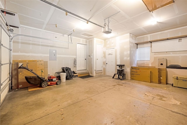 3817 Concord Dr, Missoula, MT 59808 - garage featuring a garage door opener