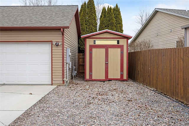 3817 Concord Dr, Missoula, MT 59808 - view of shed with a garage and fence
