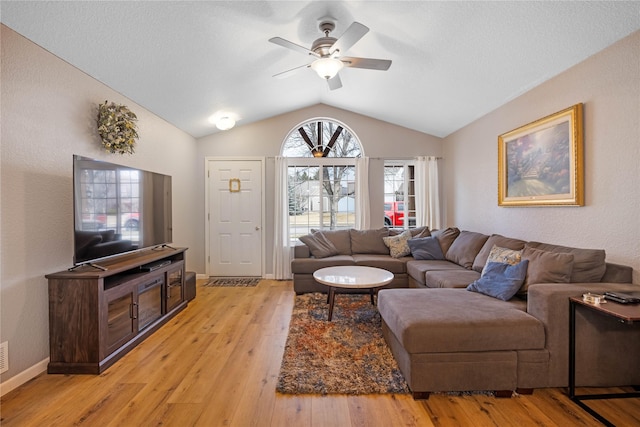 3817 Concord Dr, Missoula, MT 59808 - living room featuring vaulted ceiling, ceiling fan, and light wood-style floors