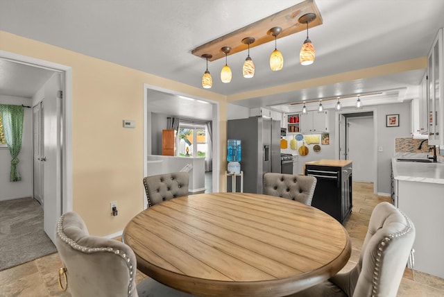 dining area with baseboards
